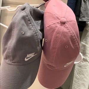 Two Nike hats